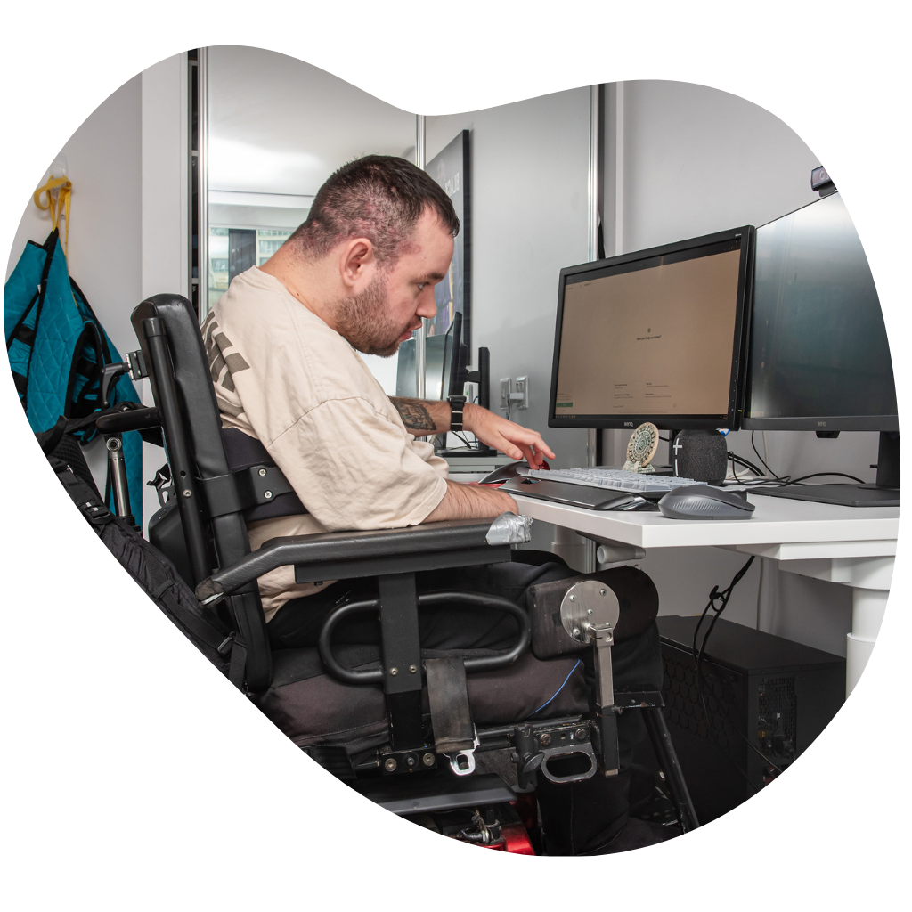 Jono sat at his desk, typing on his computer